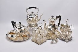 A BOX OF SILVER PLATE, including a four piece oval tea and coffee set, a similar spirit kettle on