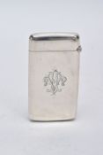 A LATE VICTORIAN SILVER CARD CASE, of a rectangular form, plain polished design with an engraved