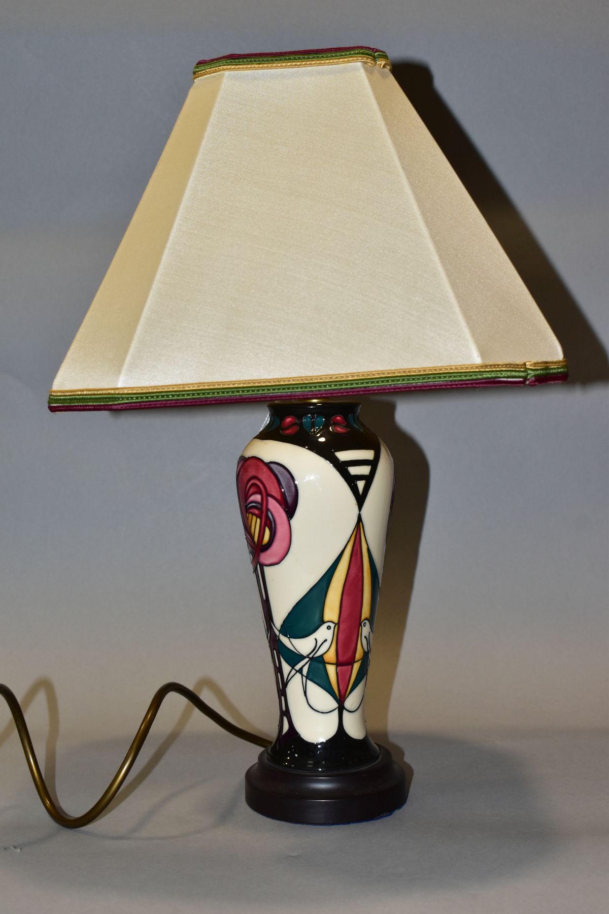 A MOORCROFT POTTERY TABLE LAMP OF BALUSTER FORM, decorated in the Melody pattern by Sian Leeper,