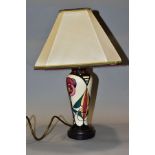 A MOORCROFT POTTERY TABLE LAMP OF BALUSTER FORM, decorated in the Melody pattern by Sian Leeper,