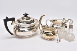 A THREE PIECE SILVER TEA SET AND TWO GLASS VINIAGRETTES, the tea service set comprising a tea pot