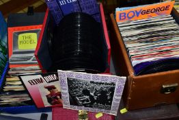 EIGHT CASES CONTAINING OVER FIVE HUNDRED 7'' SINGLES including Elvis Presley, Cliff Richard, The
