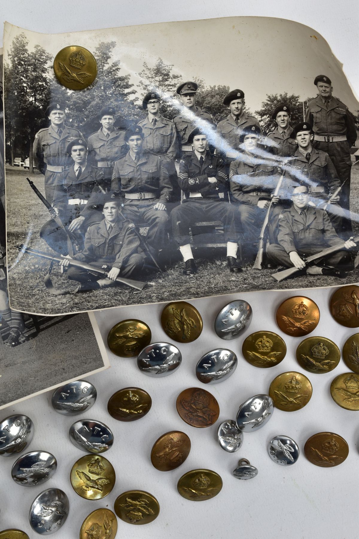 A BOX OF MILITARY RAF/ATS UNIFORM COAT & JACKET BUTTONS, with two loose black and white photos of - Image 2 of 6