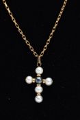 A 9CT GOLD CULTURED PEARL PENDANT NECKLET, the cross pendant made of a central black pearl and white