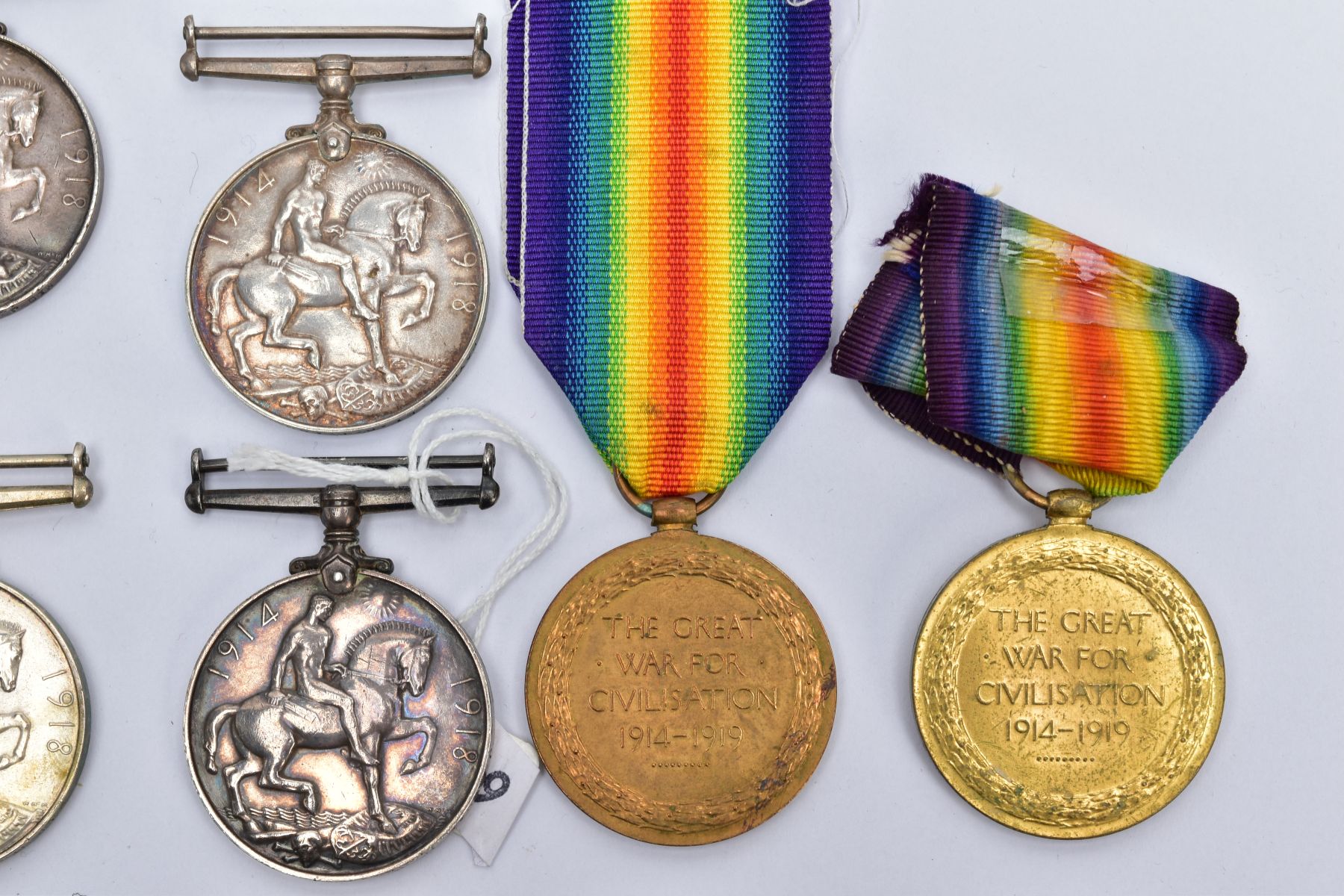 A SMALL COLLECTION OF BRITISH WWI MEDALS, comprising of a British War & Victory medals named J.52444 - Image 8 of 11
