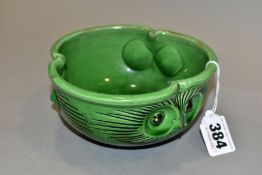 A C H BRANNAM BARUM POTTERY GREEN GLAZED BOWL PRODUCED FOR LIBERTY & CO, the sides moulded and