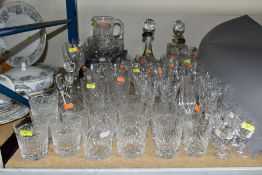 A QUANTITY OF CUT GLASS to include brandy balloons, whisky tumblers, sherry glasses, wine glasses,