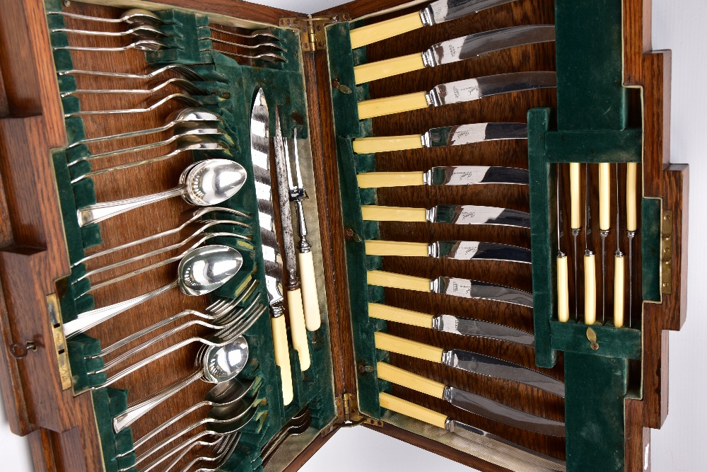 AN ART DECO OAK CASED CANTEEN OF SILVER PLATED CUTLERY, for six settings, ivorine handles, - Image 7 of 11
