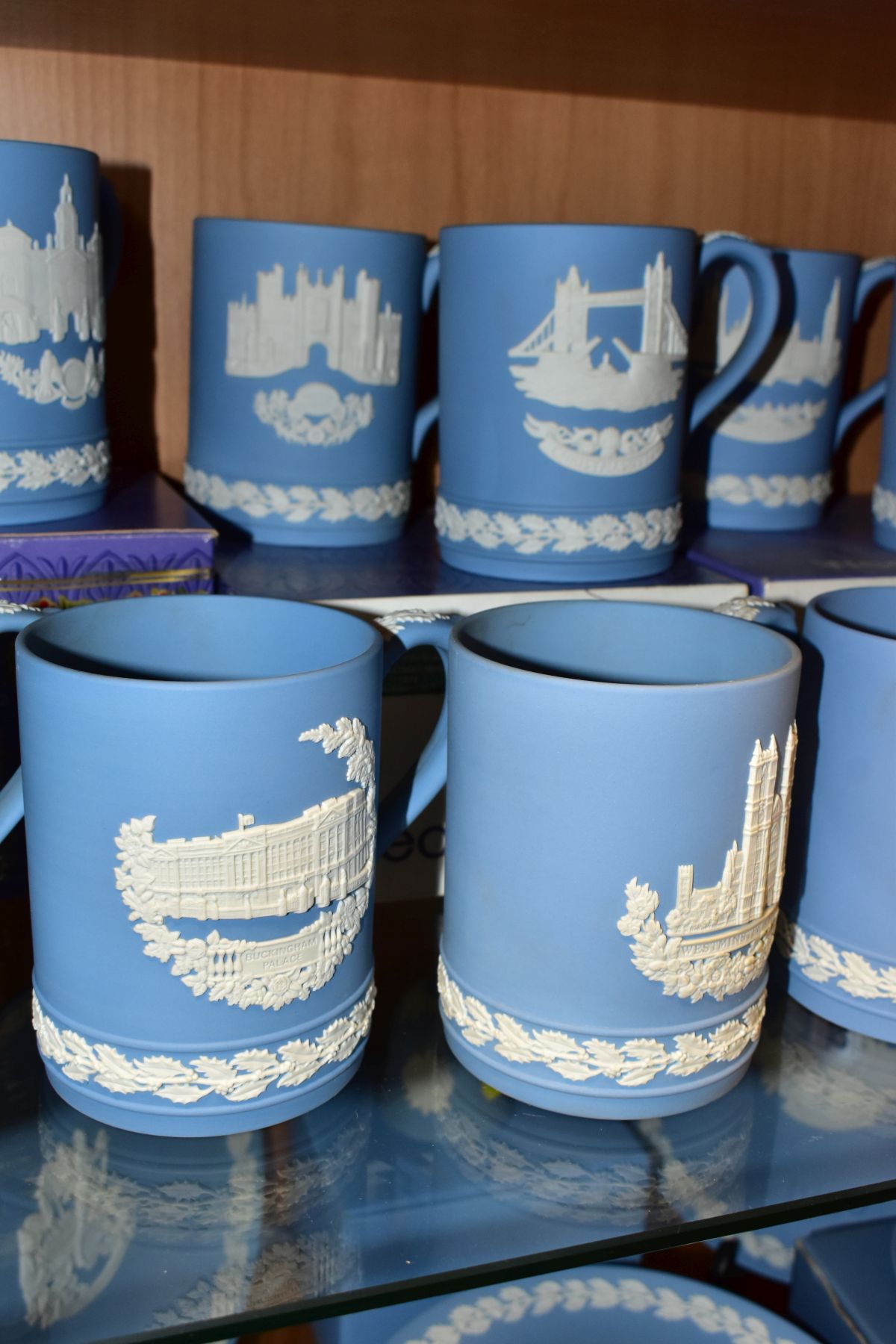 FIFTEEN WEDGWOOD PALE BLUE JASPERWARE CHRISTMAS MUGS, 1971 to 1985 inclusive, decorated with Royal - Image 4 of 9