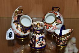 FOUR ROYAL CROWN DERBY MINIATURE ITEMS comprising two coal scuttles '2649' and '2712' patterns (