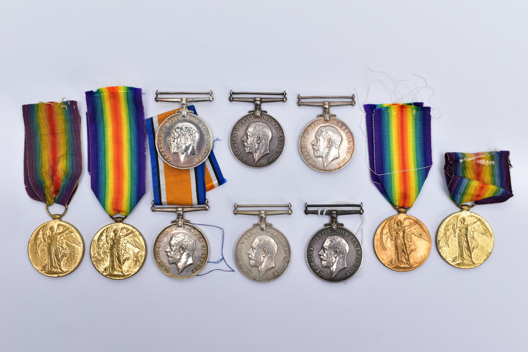 A SMALL COLLECTION OF BRITISH WWI MEDALS, comprising of a British War & Victory medals named J.52444