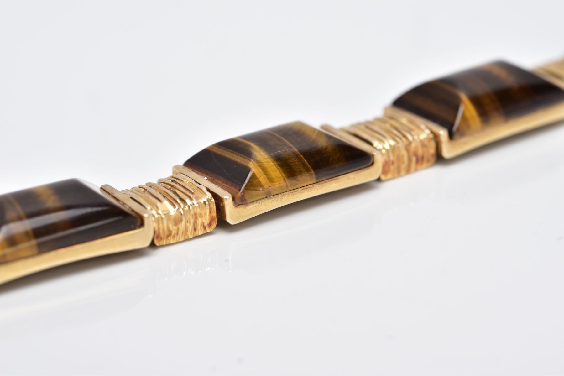 A 9CT GOLD TIGERS EYE LINE BRACELET, designed with seven rectangular shaped links set with - Image 4 of 5