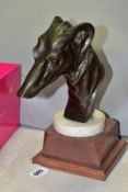 A BRONZE GREYHOUND BUST, unmarked, mounted on circular marble plinth which in turn is mounted on a