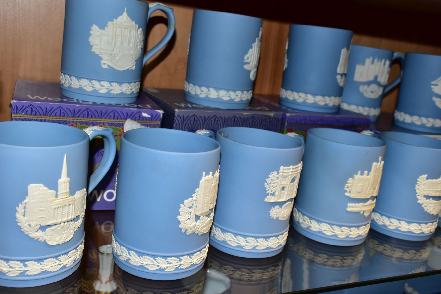 FIFTEEN WEDGWOOD PALE BLUE JASPERWARE CHRISTMAS MUGS, 1971 to 1985 inclusive, decorated with Royal - Image 6 of 9