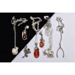 FOUR WHITE METAL PENDANT NECKLACES, A PAIR OF AMBER EARRINGS AND A CHARM, to include an amber