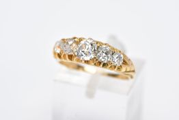 A GOLD VICTORIAN GRADUATED HALF HOOP DIAMOND RING, old cushion cut diamonds graduating in size to