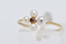 A 9CT GOLD RUBY AND PEARL RING, set with a central circular cut ruby within a four cultured pearl