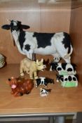 SEVEN MODELS OF COWS AND CALVES,mostly Friesians, including a Country Artists A Breed Apart '