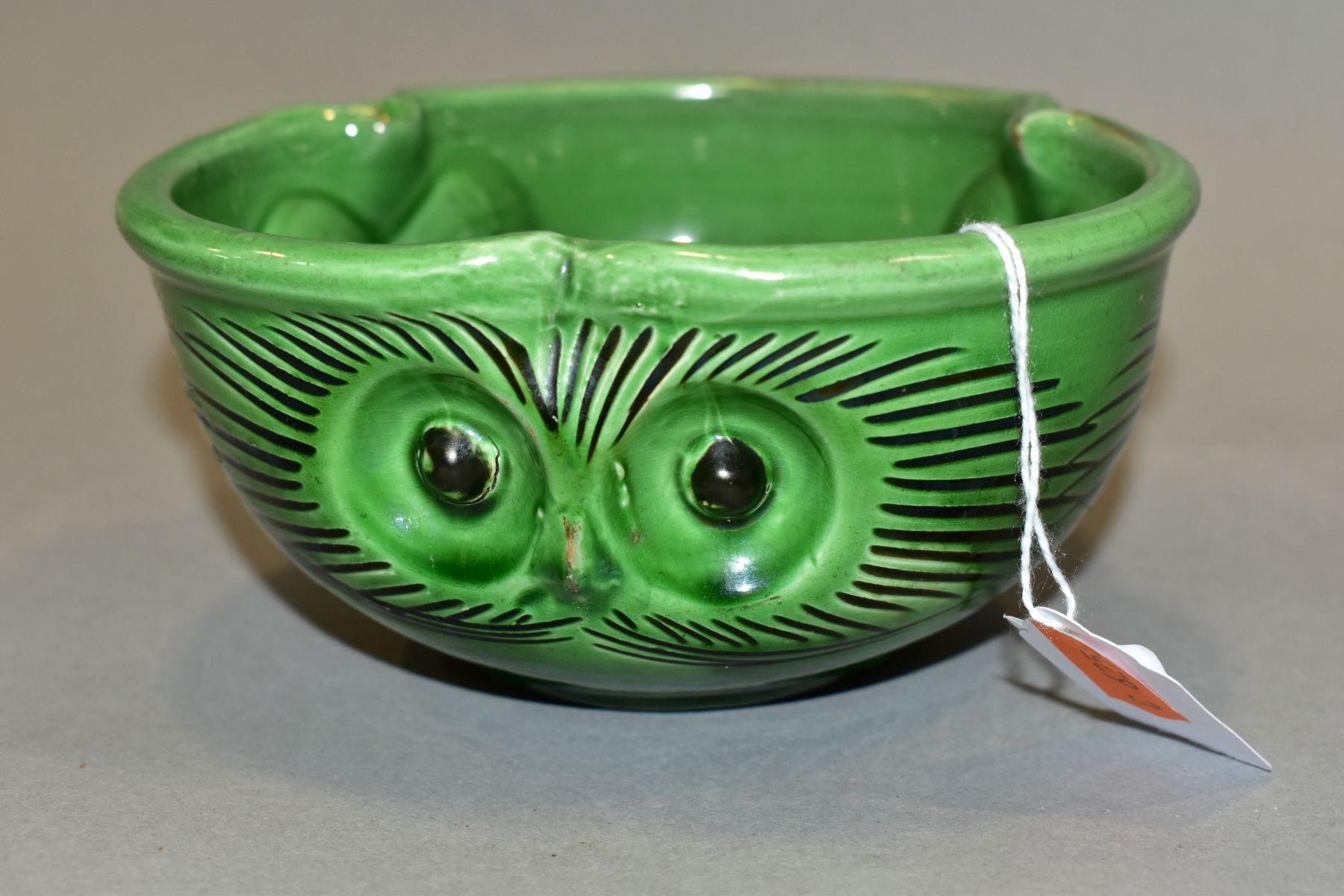 A C H BRANNAM BARUM POTTERY GREEN GLAZED BOWL PRODUCED FOR LIBERTY & CO, the sides moulded and - Image 2 of 7
