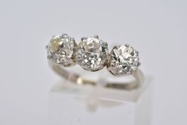 A LATE VICTORIAN TO EARLY TWENTIETH CENTURY THREE STONE DIAMOND RING, centre old cushion diamond