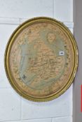 A GEORGE III OVAL NEEDLEWORK SAMPLER OF A MAP OF THE COUNTIES OF 'ENGLAND AND WALES', fine linen
