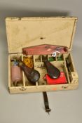 A WOODEN BOX CONTAINING BLACK POWDER FIREARMS LOADING EQUIPMENT comprising of a brass powder flask