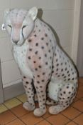 A LARGE HANSA SOFT TOY SITTING LEOPARD, pink plush with black spots with white stripe to