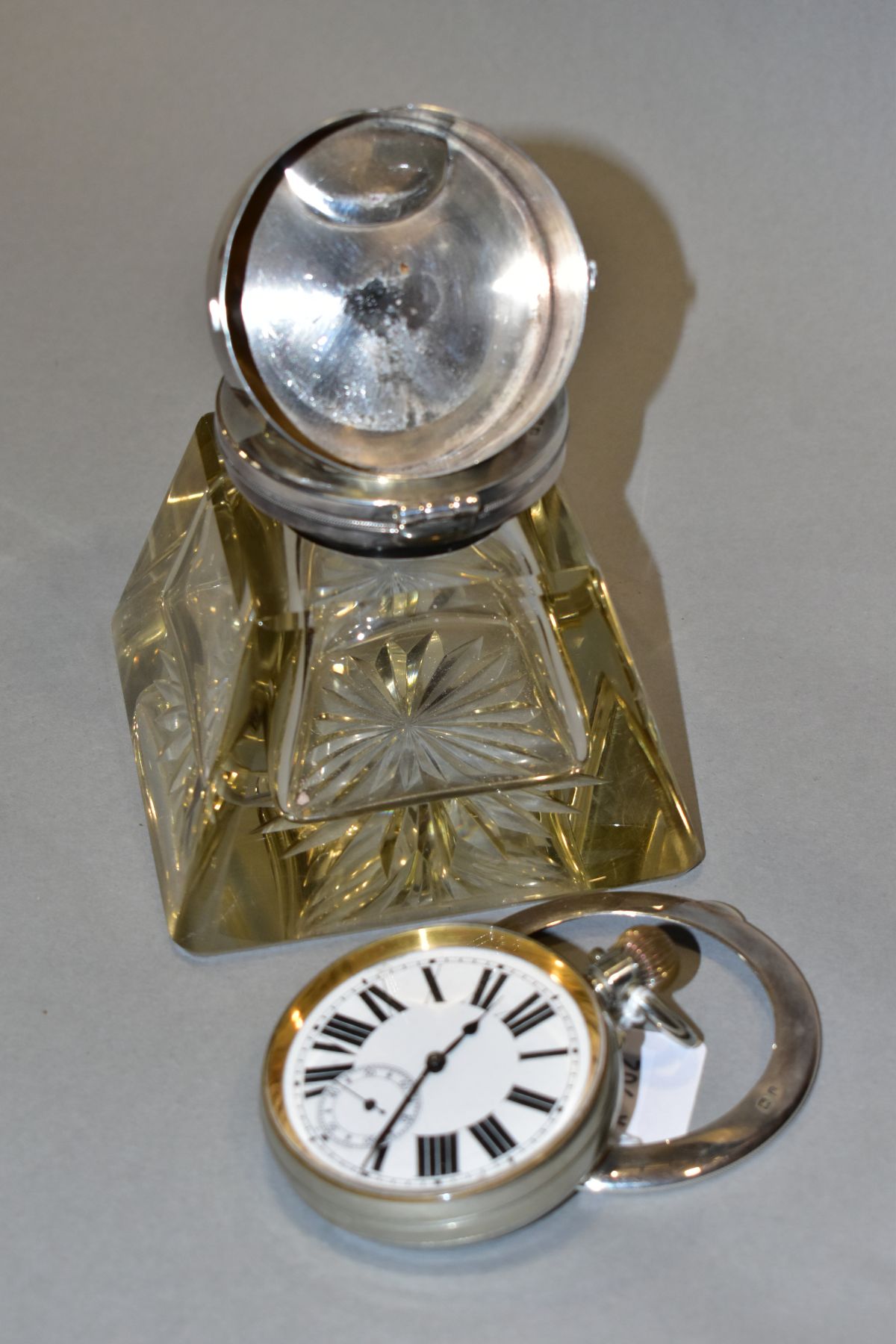 AN EDWARDIAN SILVER MOUNTED GLASS INKWELL/GOLIATH POCKET WATCH STAND, circa 1906, the hinged cover - Image 6 of 10