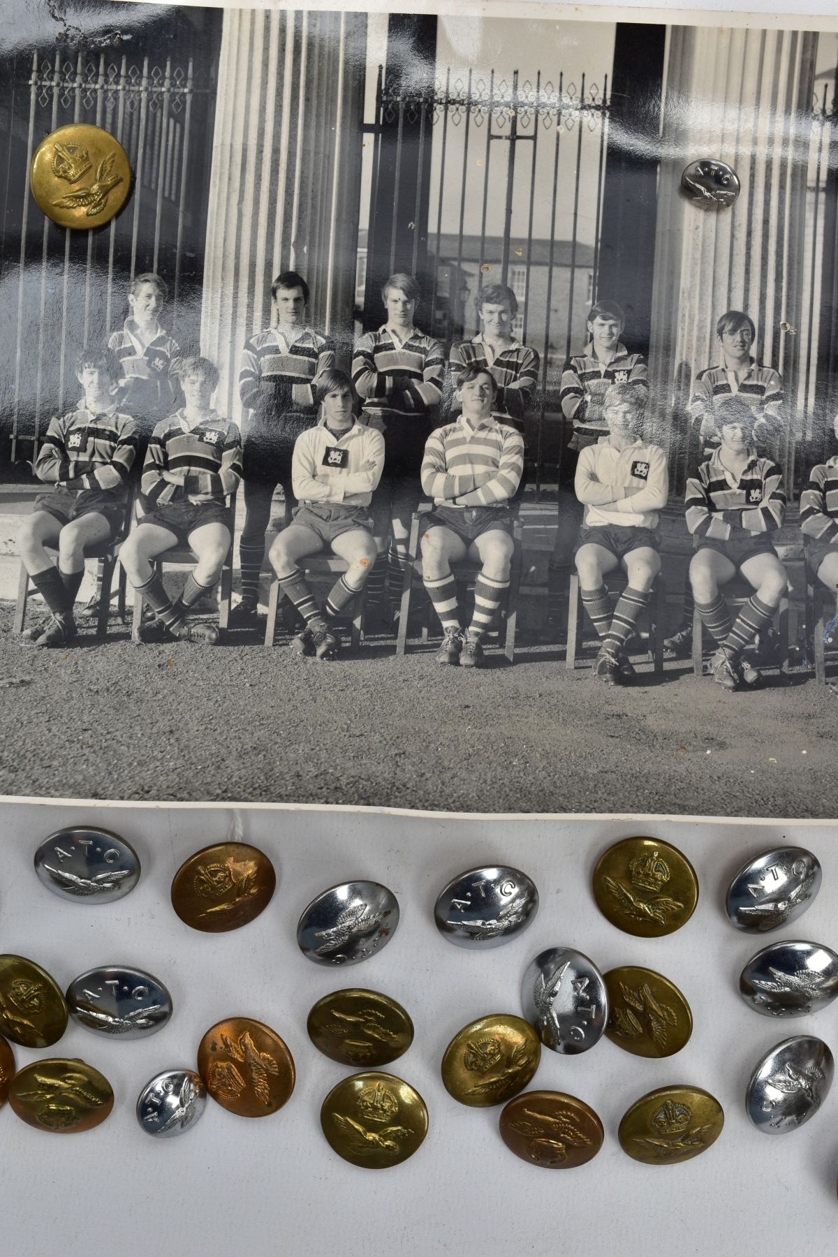 A BOX OF MILITARY RAF/ATS UNIFORM COAT & JACKET BUTTONS, with two loose black and white photos of - Image 3 of 6