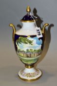 A CAVERSWALL LIMITED EDITION TWIN HANDLED URN AND COVER, the blue ground printed and tinted with a