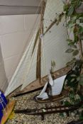 A SCRATCHBUILT WOODEN DISPLAY MODEL OF A GAFF CUTTER RIGGED SAILING BOAT, 'Britannia' constructed