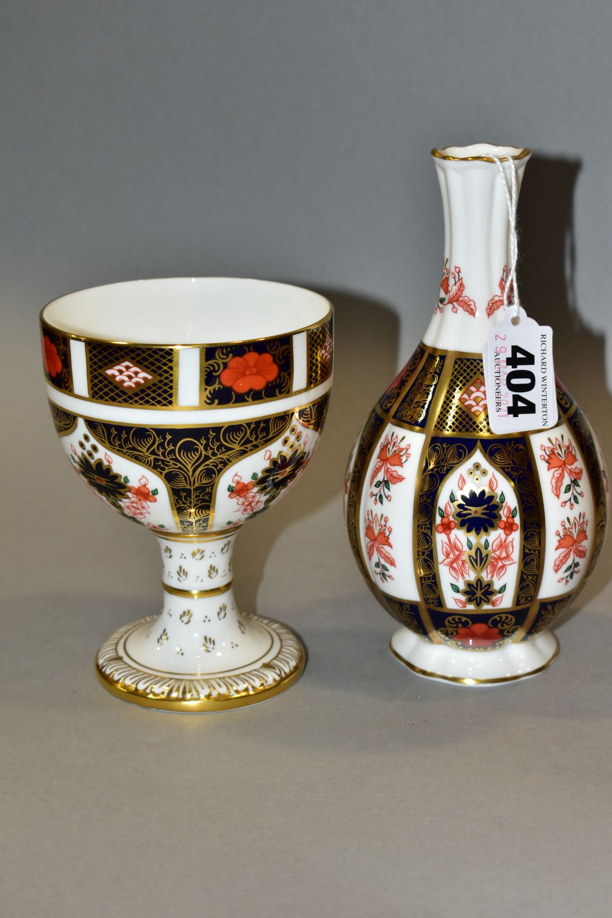 TWO ROYAL CROWN DERBY IMARI ITEMS, comprising 'Old Imari 1128' Orchid vase, printed factory mark and