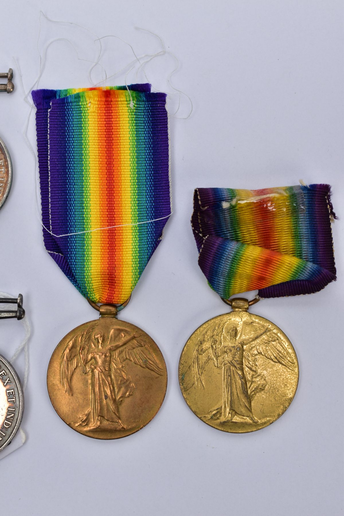 A SMALL COLLECTION OF BRITISH WWI MEDALS, comprising of a British War & Victory medals named J.52444 - Image 4 of 11