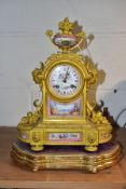 A MID 19TH CENTURY ORMOLU AND PORCELAIN MOUNTED MANTEL CLOCK, the case surmounted with a twin