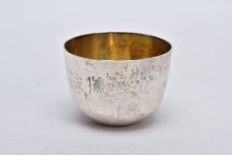 A GEORGE II SILVER TUMBLER CUP, plain polished design, engraved monogram, gilt interior,