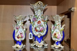 AN EARLY VICTORIAN COALPORT GARNITURE OF THREE TWIN HANDLED VASES, pierced gilt rims above floral
