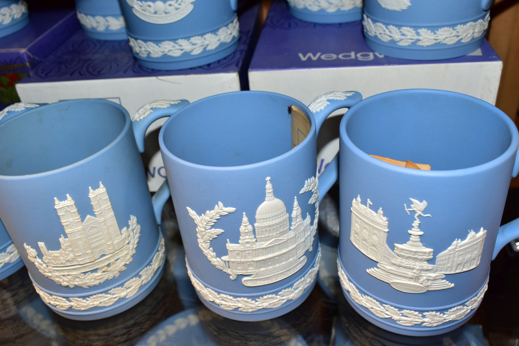 FIFTEEN WEDGWOOD PALE BLUE JASPERWARE CHRISTMAS MUGS, 1971 to 1985 inclusive, decorated with Royal - Image 9 of 9