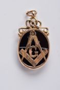 A 9CT GOLD AGATE MASONIC PENDANT, the banded agate of an oval form depicting a gold Masonic motif