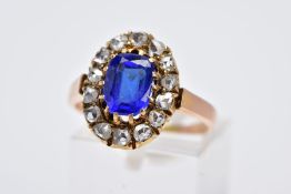 A GOLD ROSE CUT DIAMOND AND BLUE PASTE OVAL CLUSTER RING, estimated rose cut diamond weight 0.