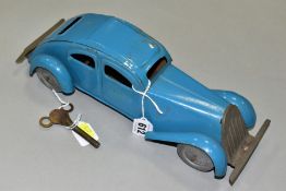 AN UNMARKED TINPLATE CLOCKWORK SALOON CAR, appears complete but has some minor damage and paint loss