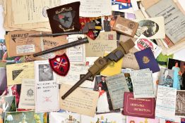 A BOX CONTAINING A LARGE AMOUNT OF PAPER EPHEMERA, including military documents, postcards,