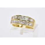 A MODERN 18CT GOLD DOUBLE ROW DIAMOND RING, two rows of princess cut diamonds slightly tapering in