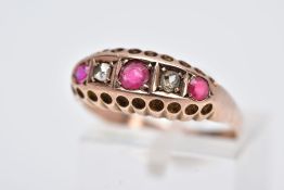 AN EARLY 20TH CENTURY 9CT GOLD BOAT RING, set with two rose cut diamonds, a single circular cut ruby