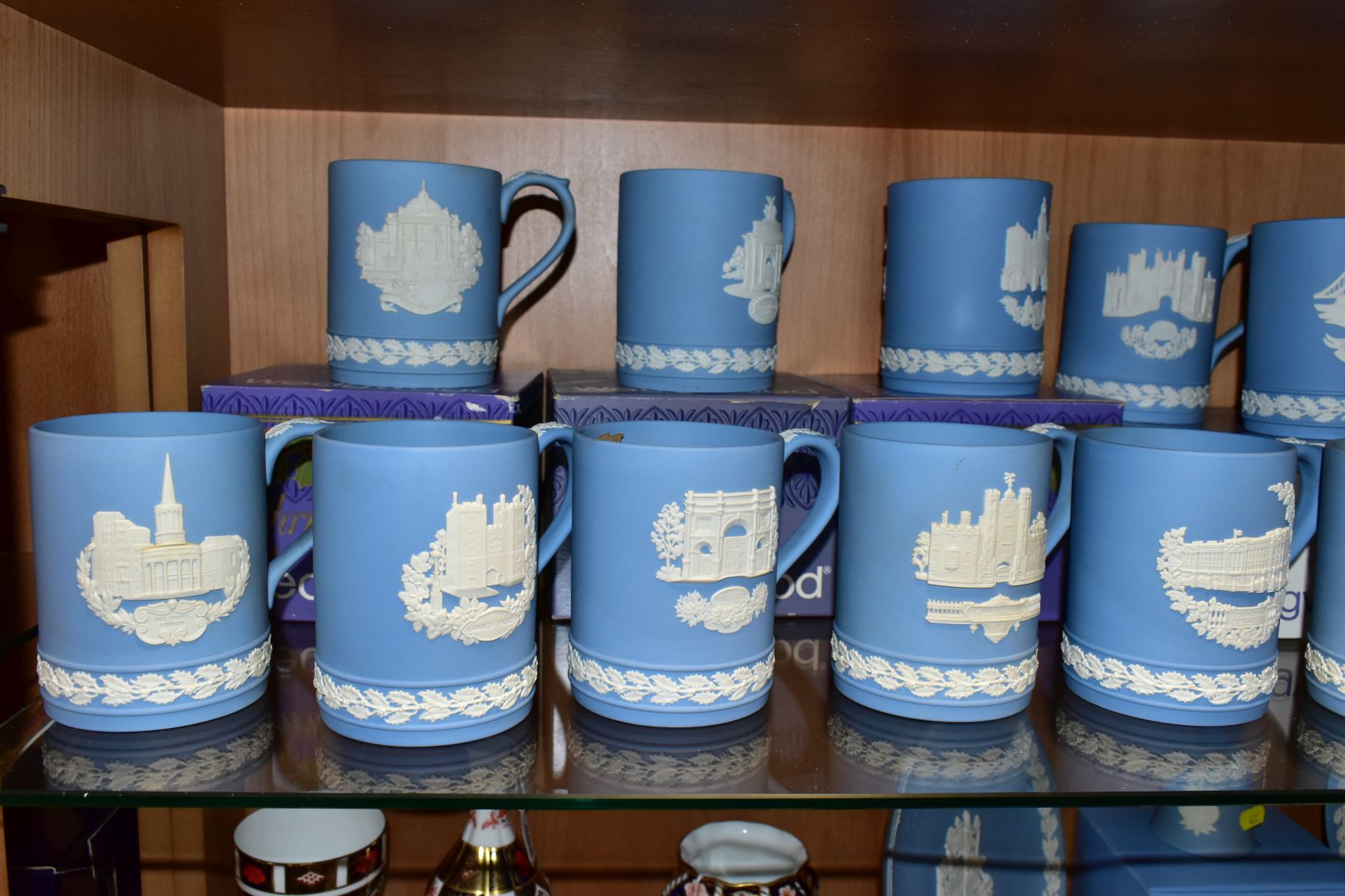 FIFTEEN WEDGWOOD PALE BLUE JASPERWARE CHRISTMAS MUGS, 1971 to 1985 inclusive, decorated with Royal - Image 2 of 9