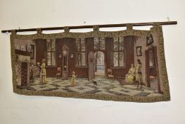 A 20TH CENTURY MACHINE WOVEN TAPESTRY WALL HANGING AND POLE, depicting a Dutch interior scene with