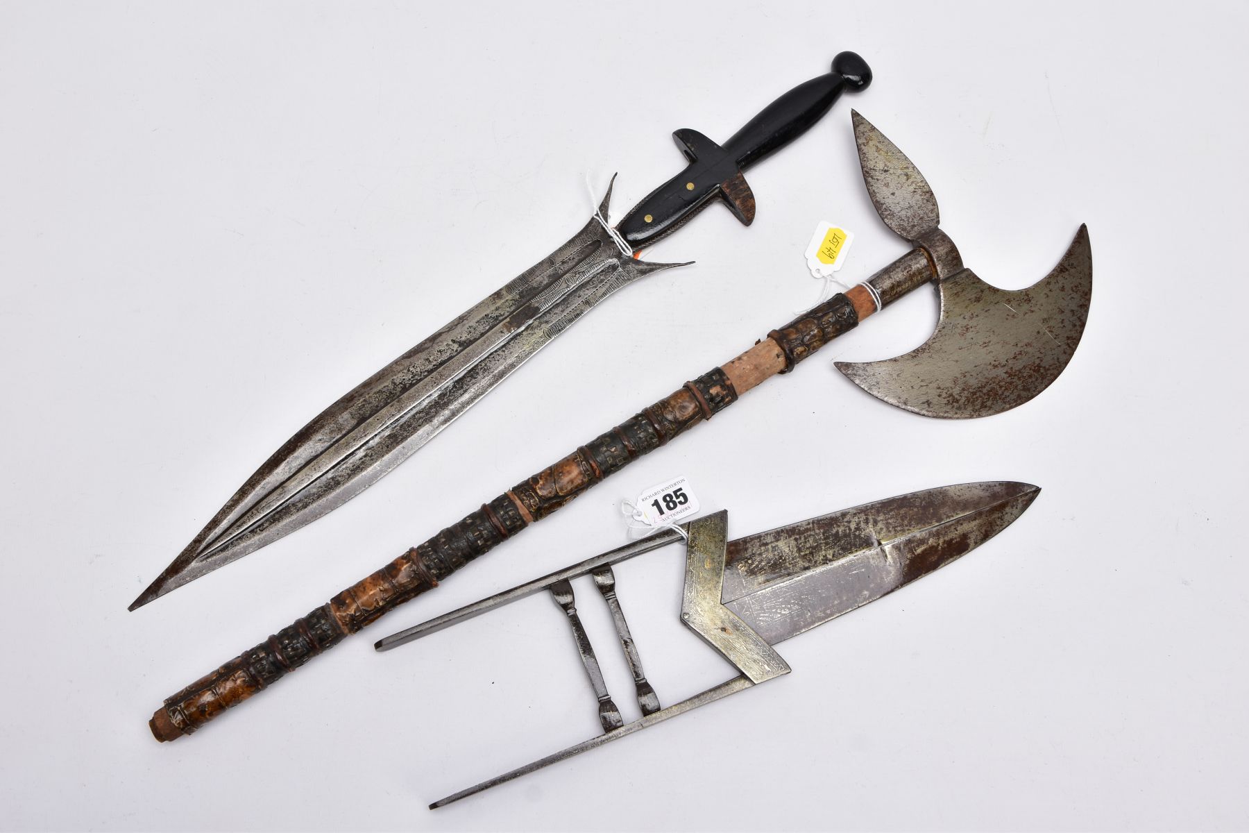 THREE BLADED WEAPONS OF EASTERN EUROPEAN/AFRICAN/ASIAN ORIGINS comprising of a small hand axe - Image 10 of 15
