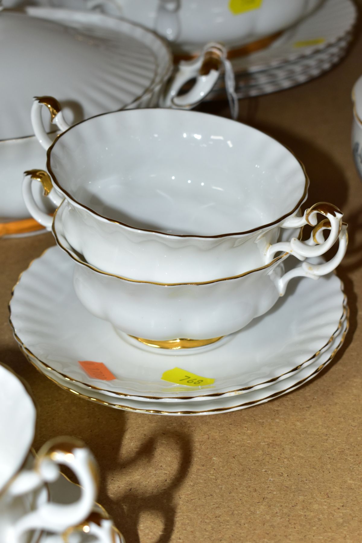 A ROYAL ALBERT VAL D'OR PART DINNER SERVICE, comprising seven soup bowls and six saucers, an oval - Image 4 of 7