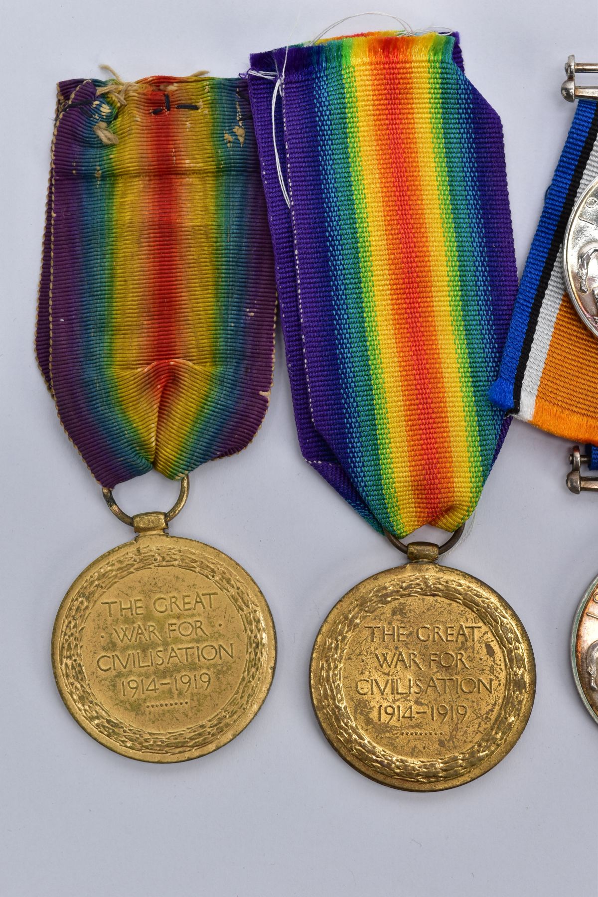 A SMALL COLLECTION OF BRITISH WWI MEDALS, comprising of a British War & Victory medals named J.52444 - Image 6 of 11