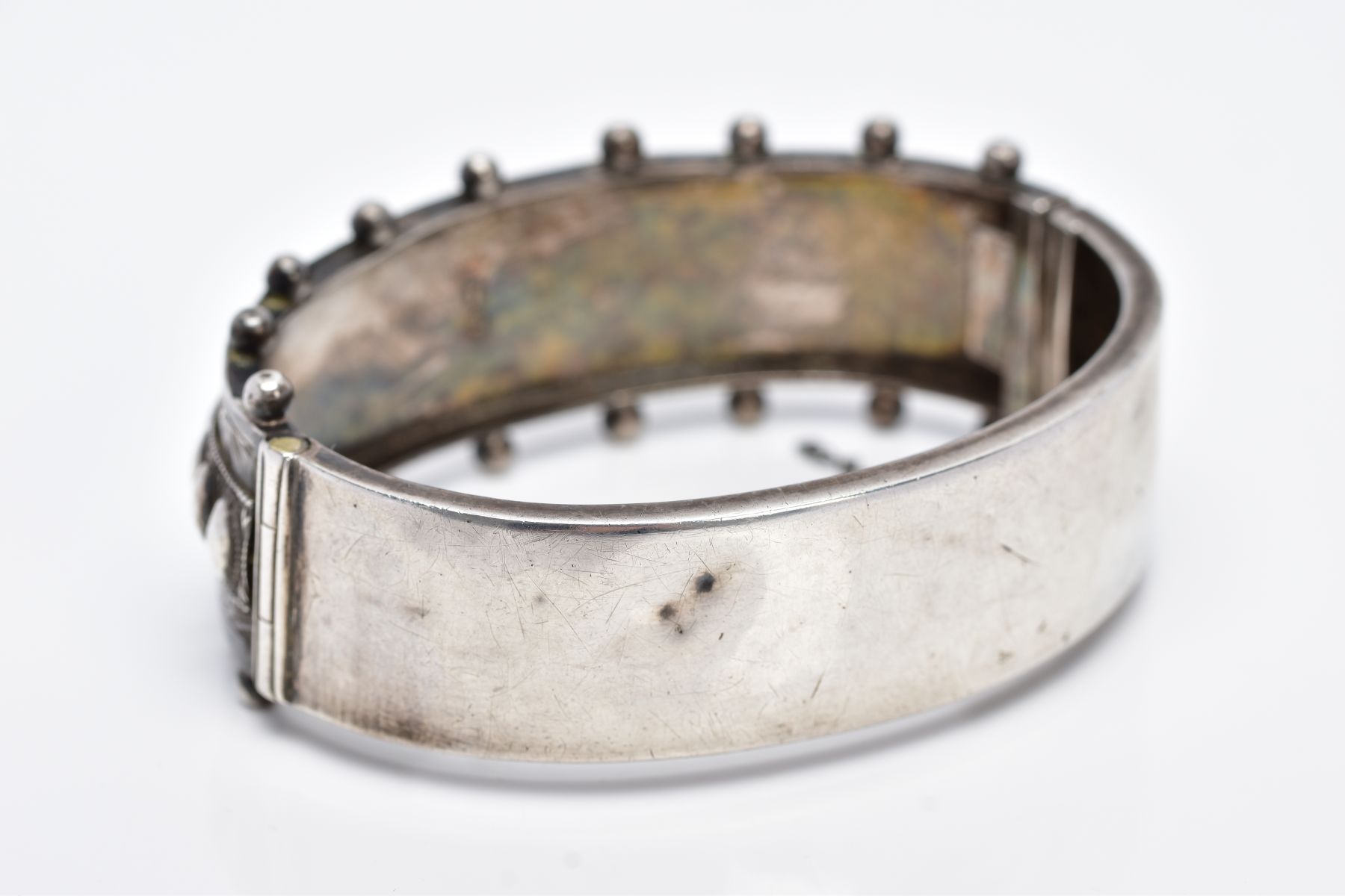 A VICTORIAN SILVER BANGLE, applied bead word decoration and half engraved, measuring 20.0mm in - Image 4 of 5