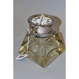 AN EDWARDIAN SILVER MOUNTED GLASS INKWELL/GOLIATH POCKET WATCH STAND, circa 1906, the hinged cover